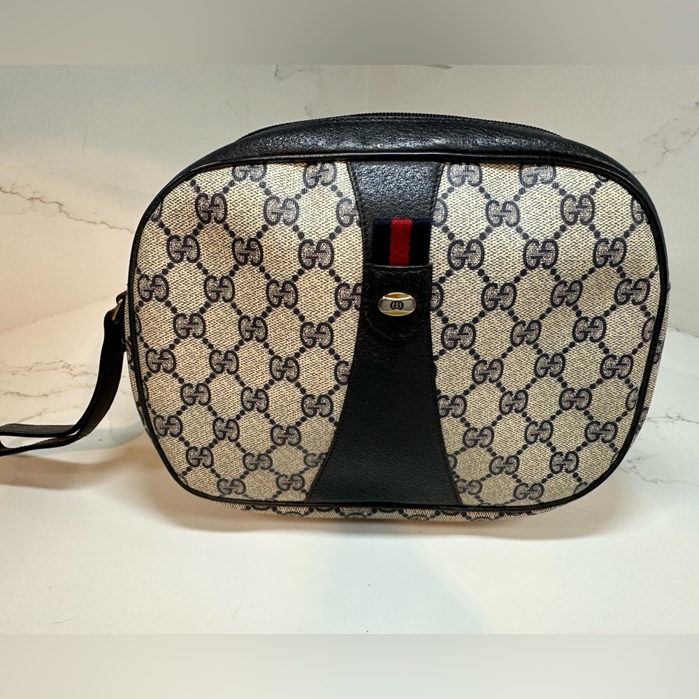 Gucci GG Canvas Plus Clutch